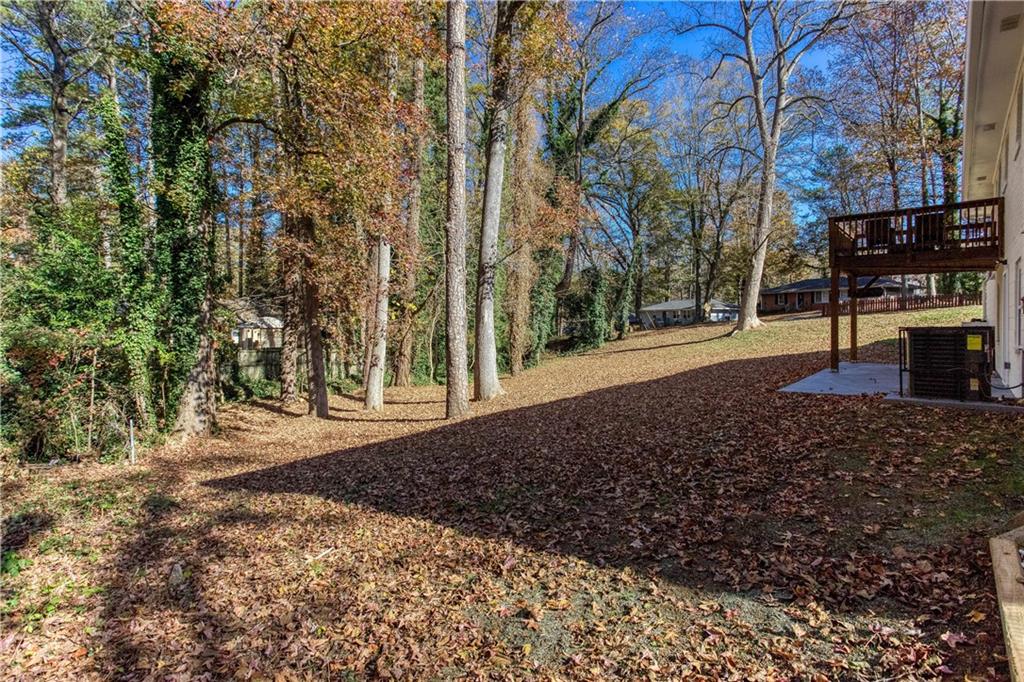 1560 North Columbia Place Decatur, GA 30032 - Photo 49 of 50 a view of a backyard with large trees