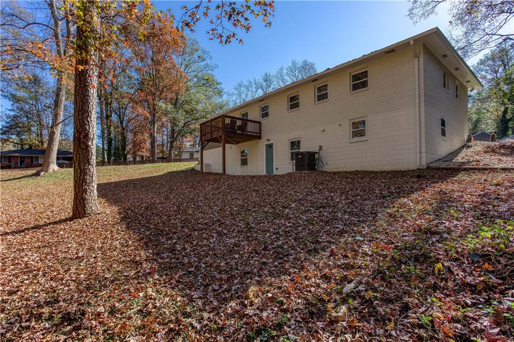 1560 North Columbia Place Decatur, GA 30032 - Photo 50 of 50 a large white house with a white fence