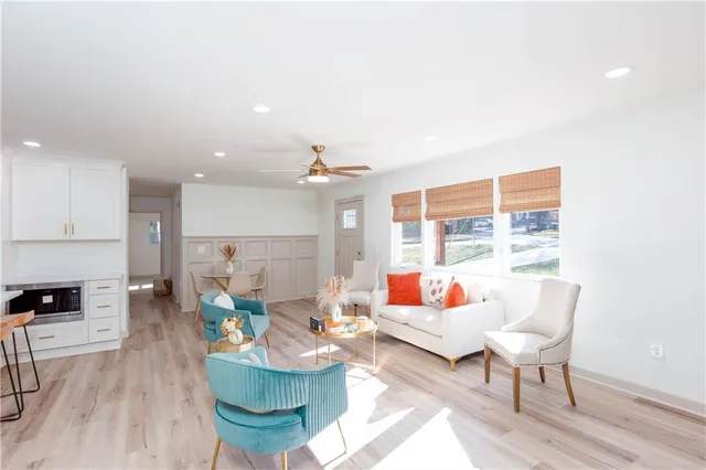 a living room with furniture and a couch