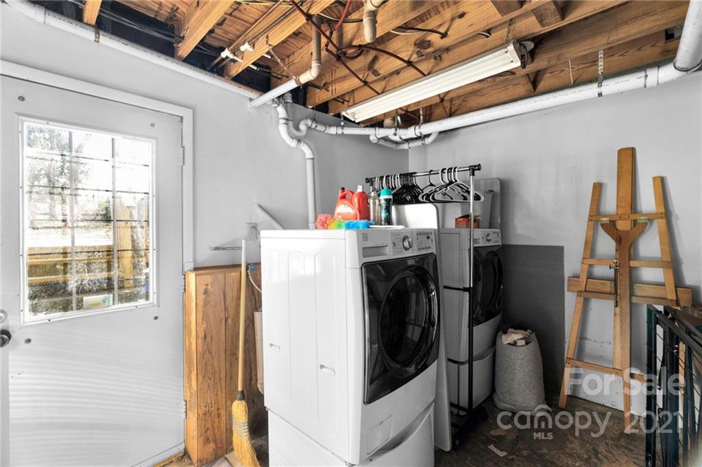 4800 Cheviot Road Charlotte, NC 28269 - Photo 22 of 34 a view of a storage & utility room with washer and dryer