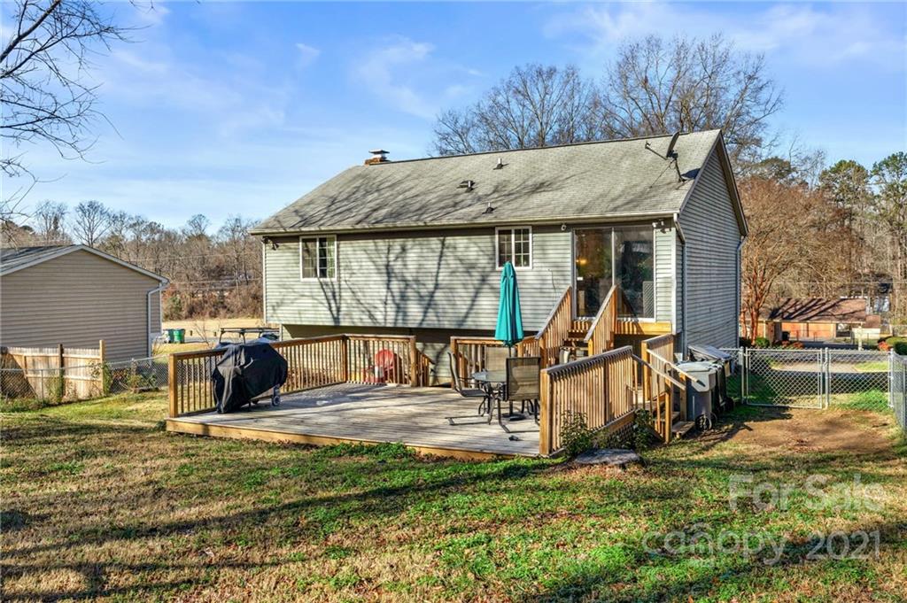 4800 Cheviot Road Charlotte, NC 28269 - Photo 28 of 34 an outdoor space with furniture and garden