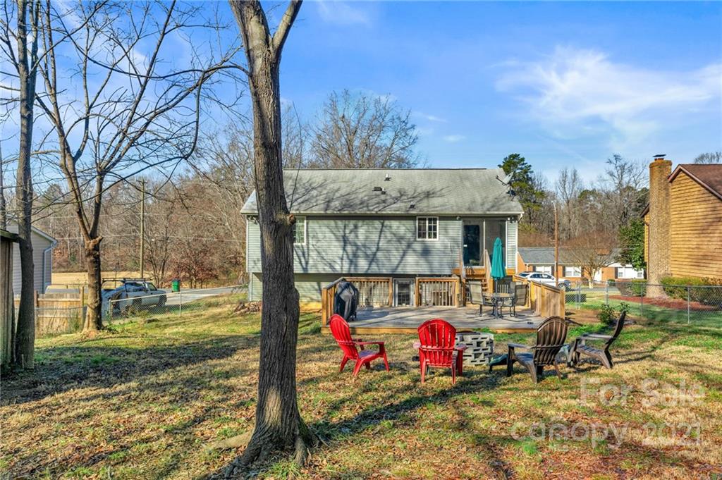 4800 Cheviot Road Charlotte, NC 28269 - Photo 29 of 34 a view of outdoor space with seating area and barbeque oven