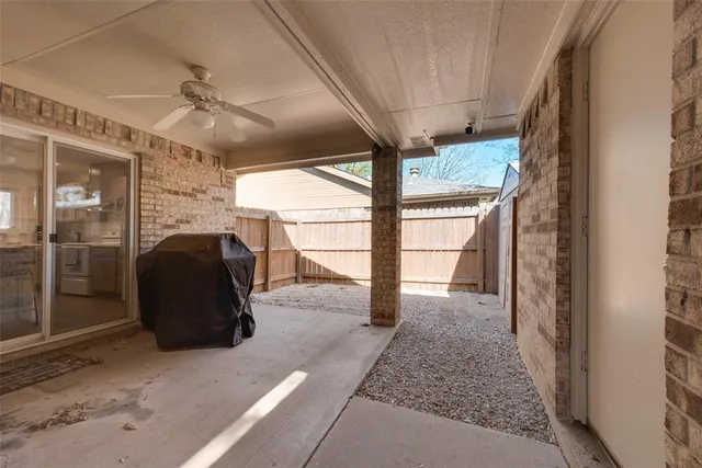 a view of a glass door and porch