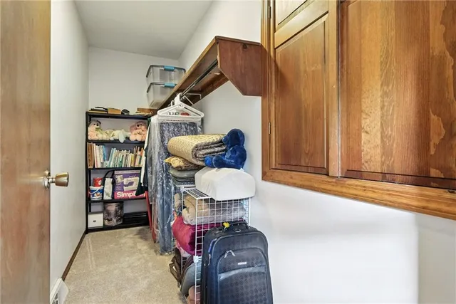 a bedroom with bed and window