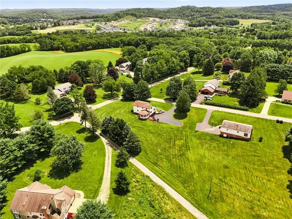 a view of a lake with a garden
