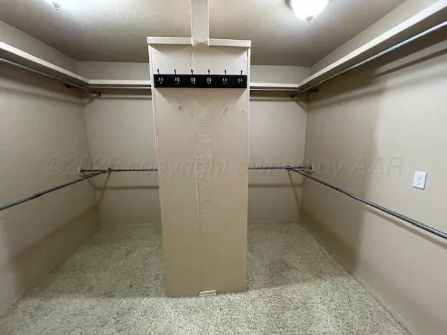 a view of empty room with windows