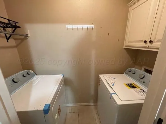 a bathroom with a tub a sink and a shower