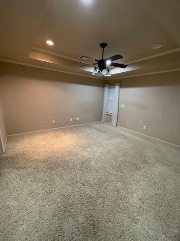 a view of a big room with carpet