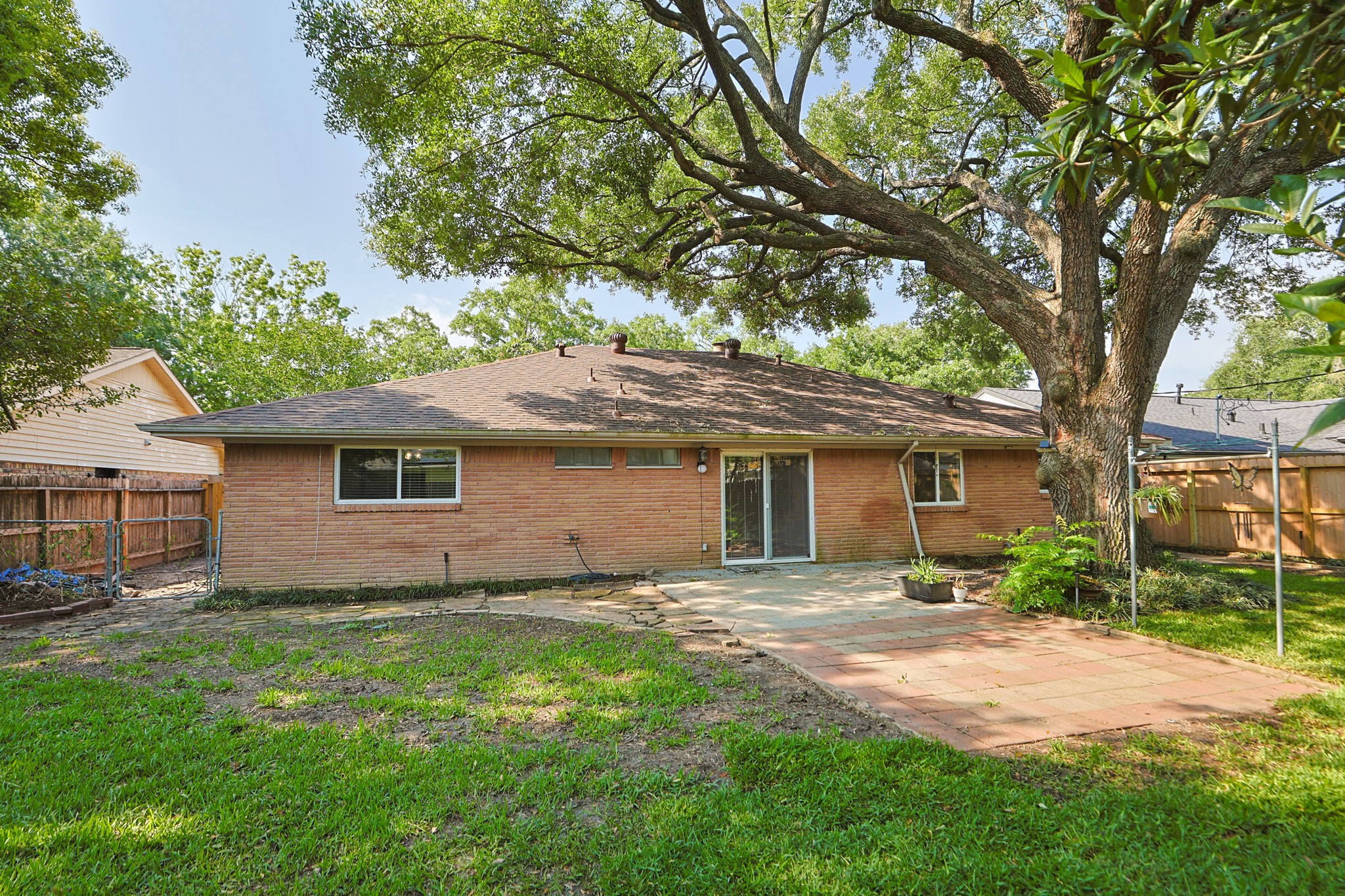 5410 Indigo Street Houston, TX 77096 - Photo 24 of 30 Step outside to an expansive backyard with endless possibilities for your relaxation and entertainment with updated sprinkler system.