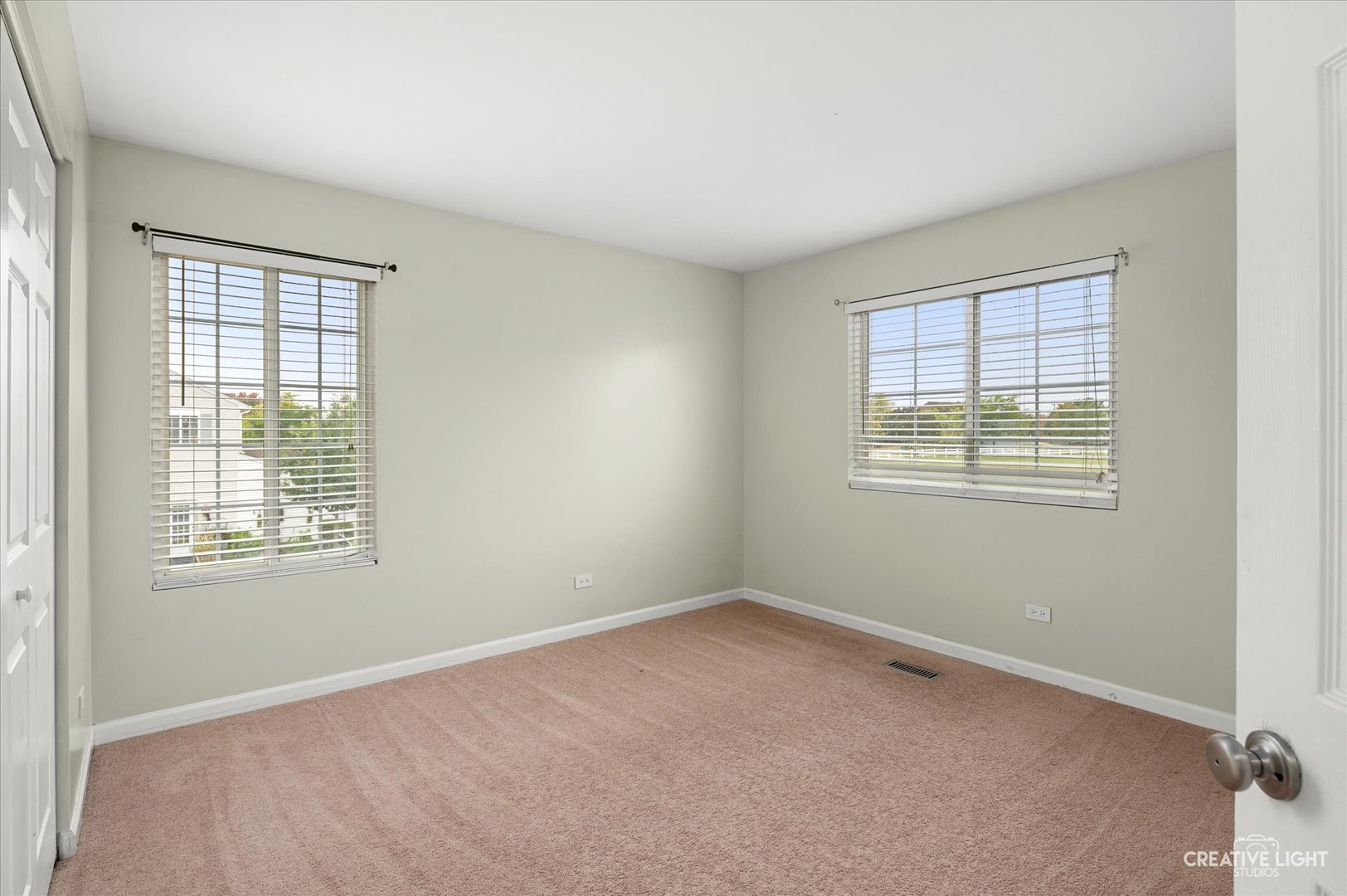 179 Azalea Circle, Unit 179 Romeoville, IL 60446 - Photo 12 of 16 an empty room with a window