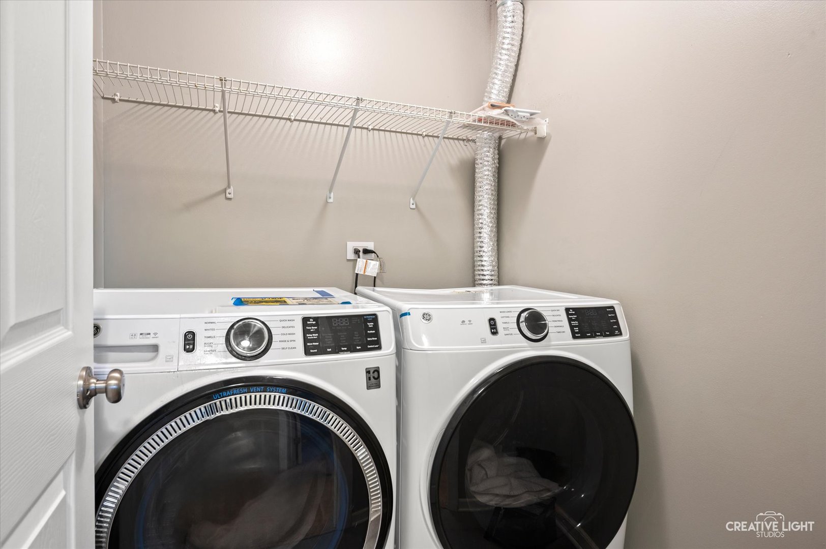 179 Azalea Circle, Unit 179 Romeoville, IL 60446 - Photo 15 of 16 a utility room with dryer and washer