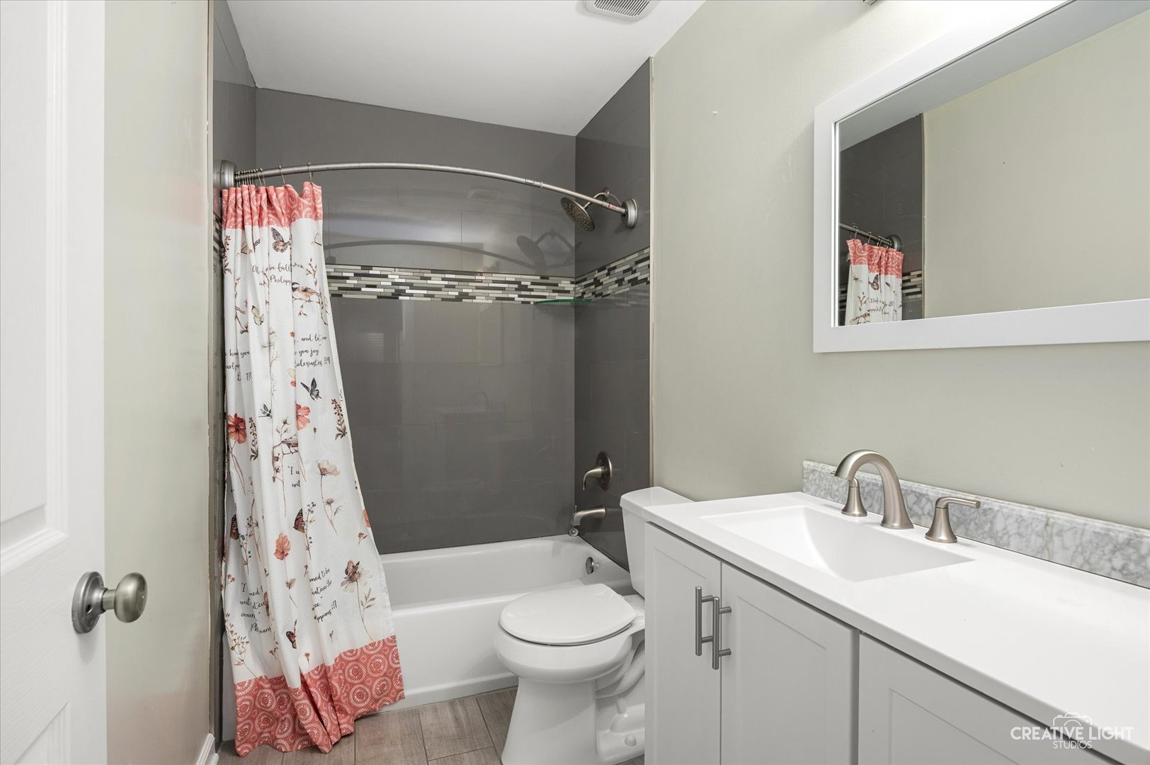 179 Azalea Circle, Unit 179 Romeoville, IL 60446 - Photo 10 of 16 a bathroom with a sink and mirror with toilet