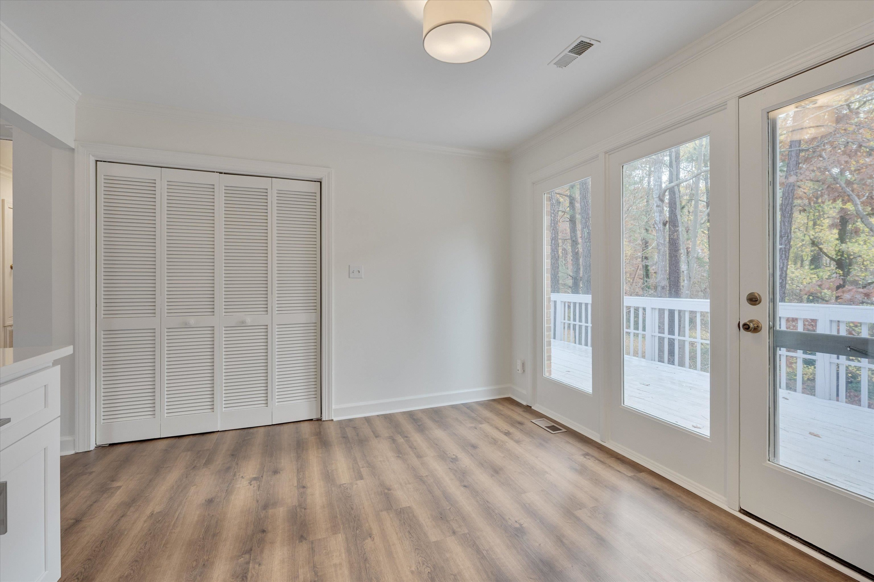 5500 Fortunes Ridge Drive, Unit 106D Durham, NC 27713 - Photo 11 of 30 an empty room with windows