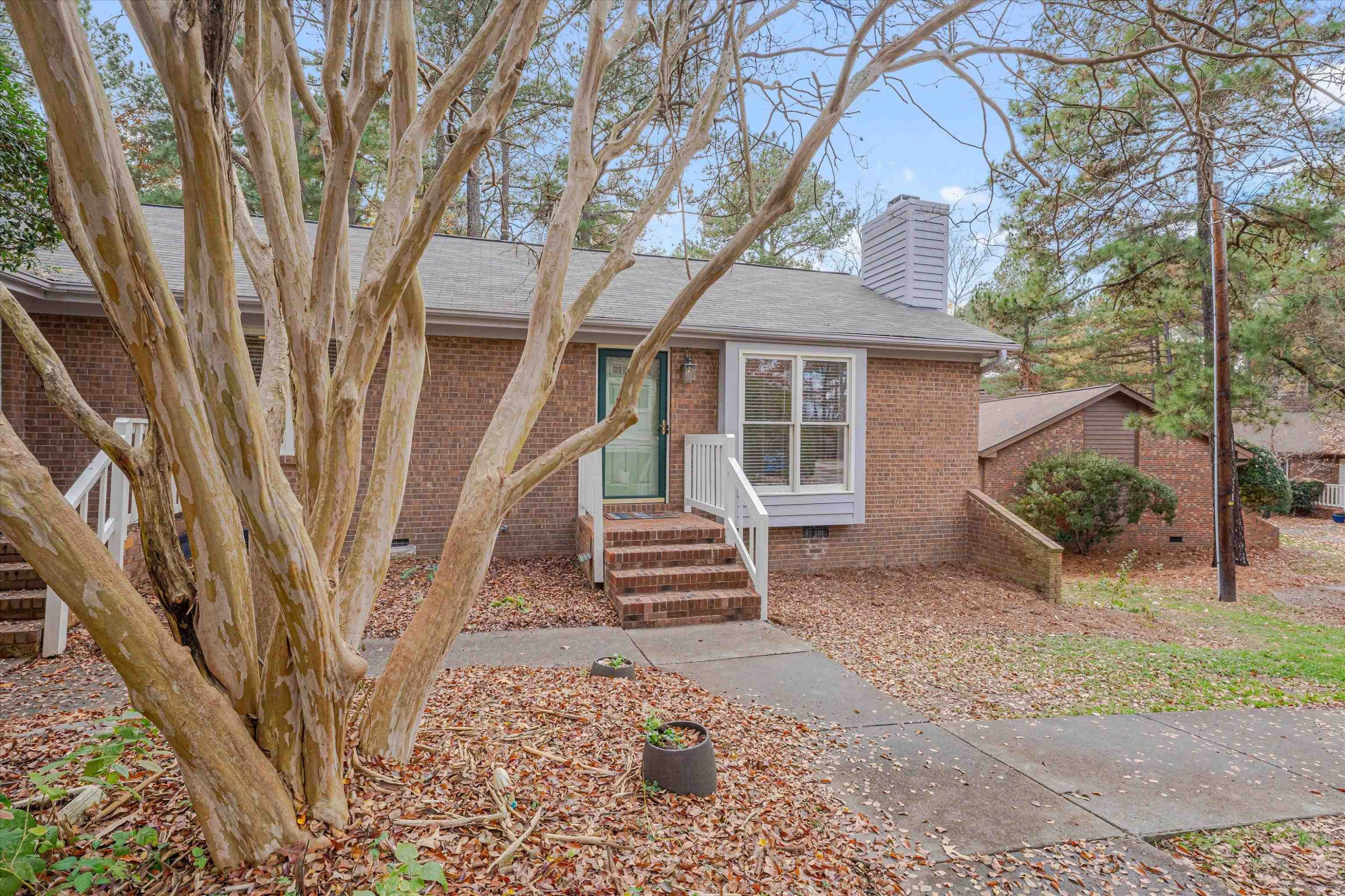 5500 Fortunes Ridge Drive, Unit 106D Durham, NC 27713 - Photo 2 of 30 a front view of a house with stairs