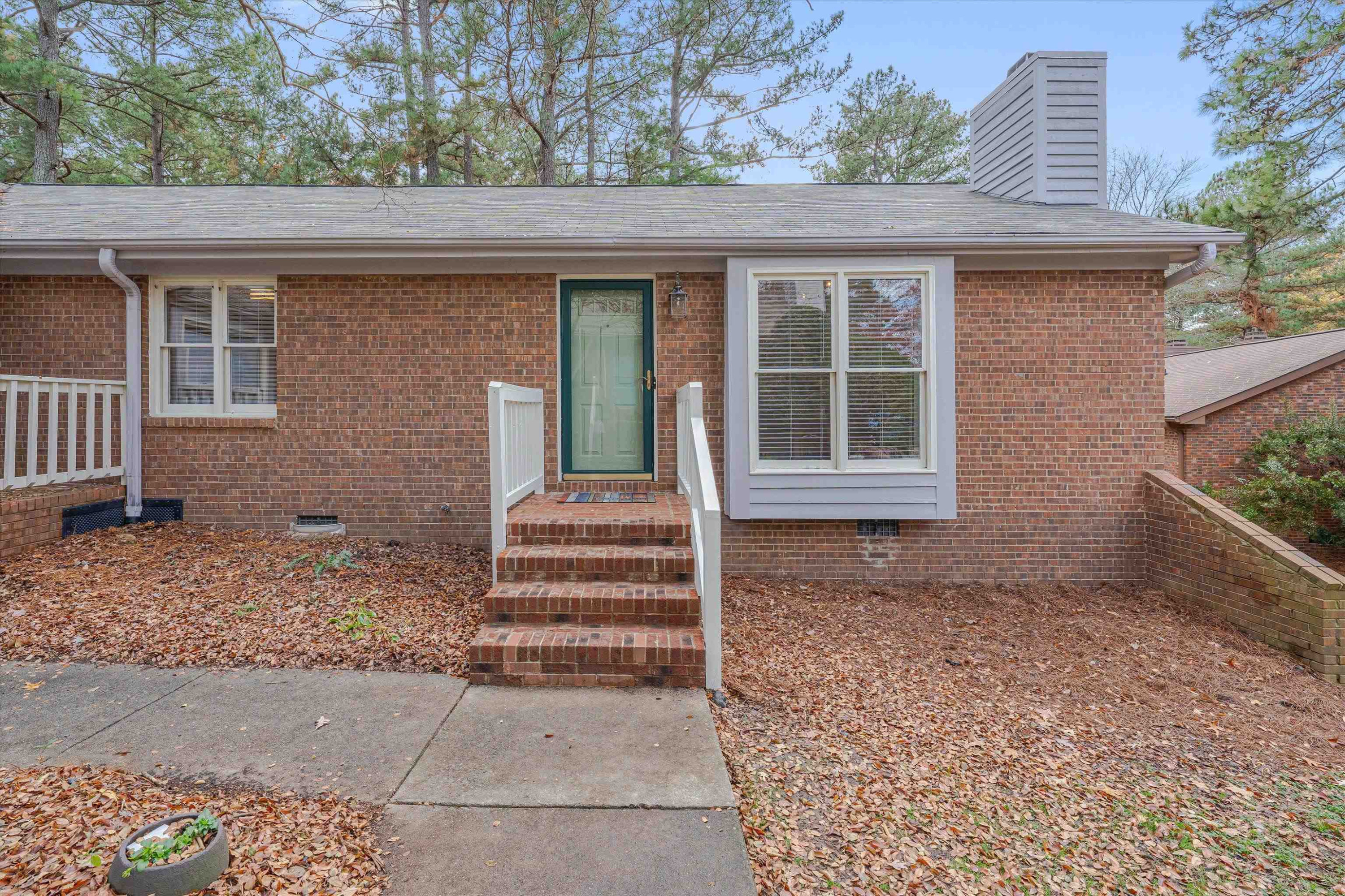 5500 Fortunes Ridge Drive, Unit 106D Durham, NC 27713 - Photo 3 of 30 a front view of a house with a large window