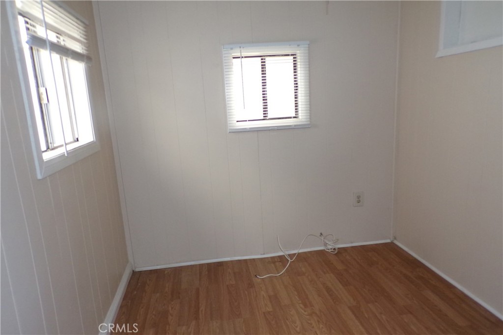 12710 3rd Street, Unit 57 Yucaipa, CA 92399 - Photo 10 of 13 an empty room with a window