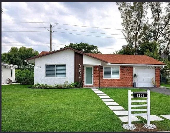 a front view of house with yard