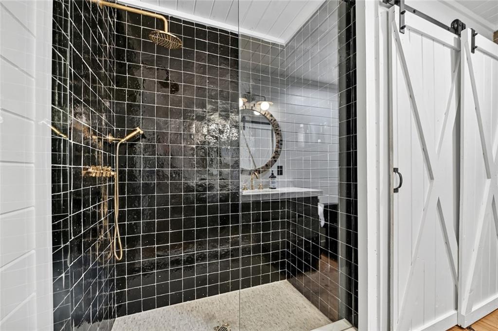 545 Chestnut Ridge Circle Blue Ridge, GA 30513 - Photo 19 of 34 a bathroom with a shower