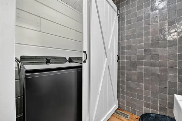 a utility room with dryer and washer