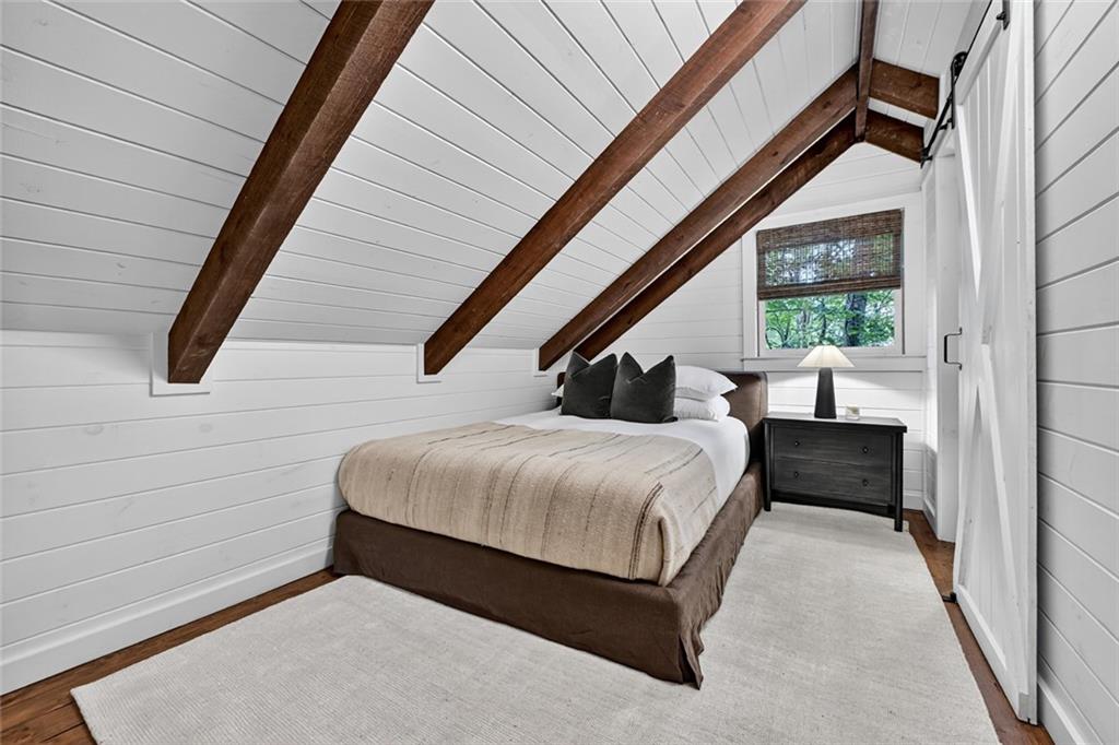 545 Chestnut Ridge Circle Blue Ridge, GA 30513 - Photo 27 of 34 a bedroom with a bed and window