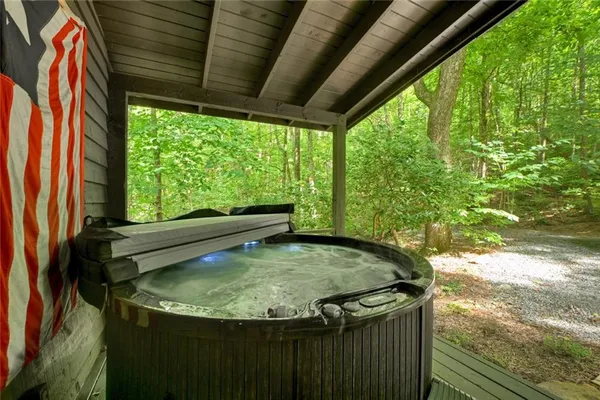 a view of a swimming pool with a outdoor seating