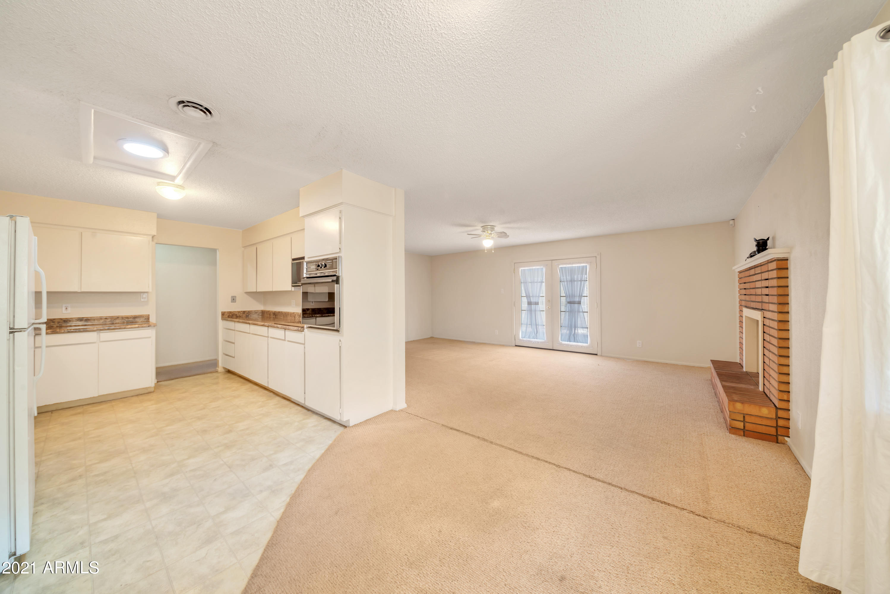 4140 West Ocotillo Road Phoenix, AZ 85019 - Photo 8 of 27 Dining into Family Room