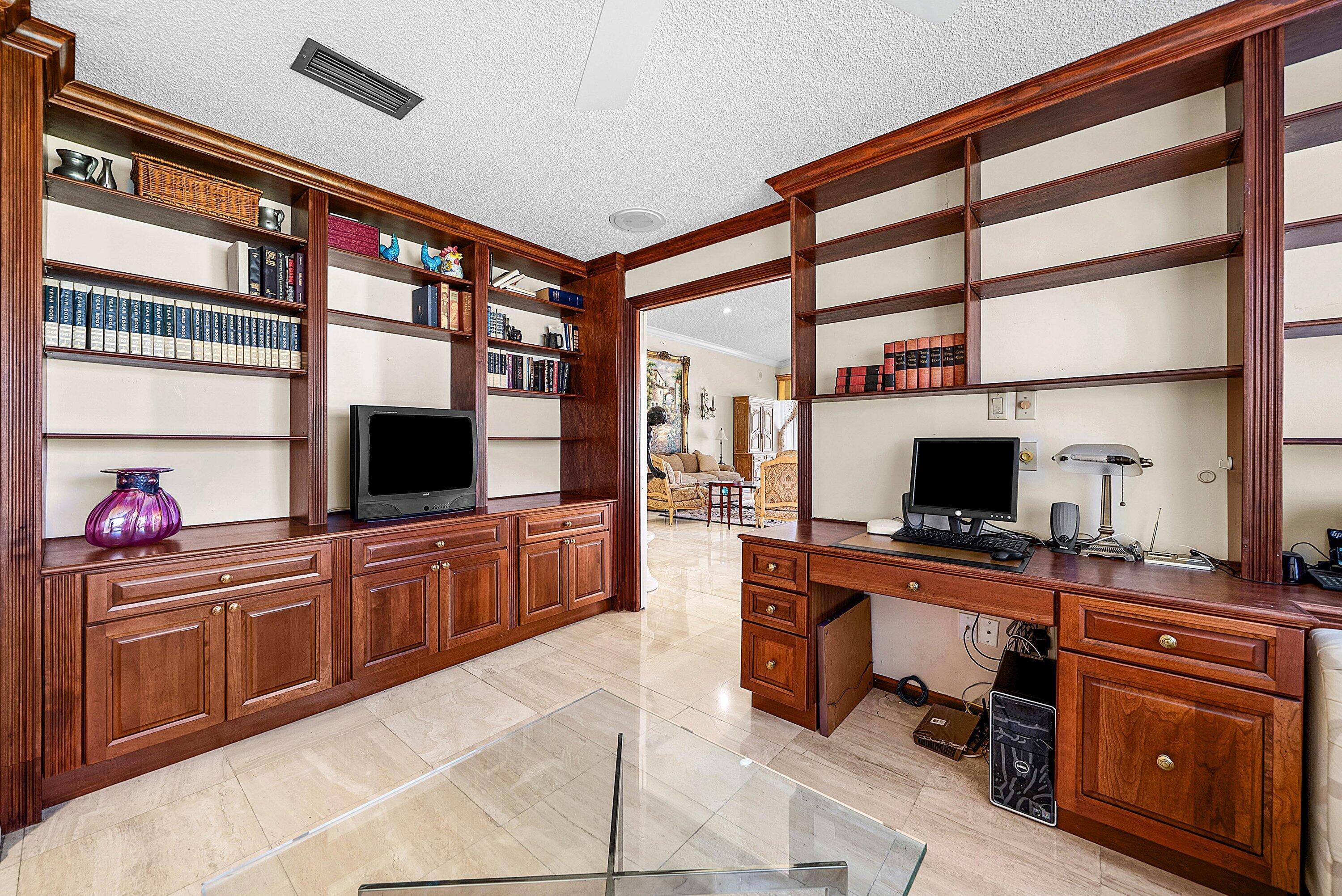 21459 Bridgeview Drive Boca Raton, FL 33428 - Photo 27 of 61 a kitchen with stainless steel appliances a stove top oven and a sink