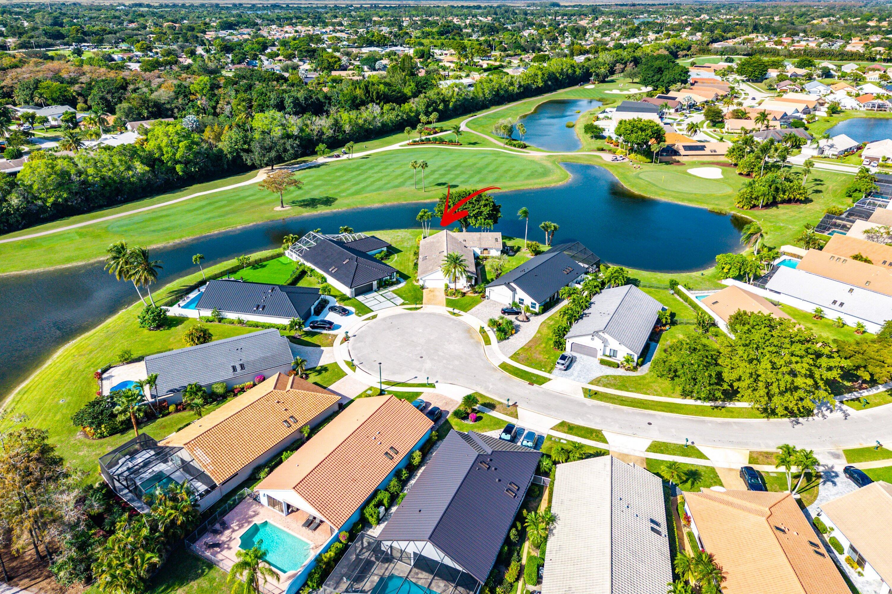 21459 Bridgeview Drive Boca Raton, FL 33428 - Photo 9 of 61 an aerial view of tennis court