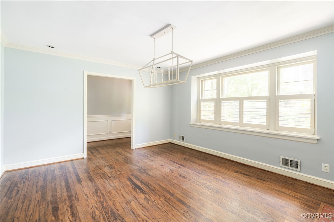 3925 Sherbrook Road Richmond, VA 23235 - Photo 8 of 49 Front room w/ chandelier, Wood burning FP