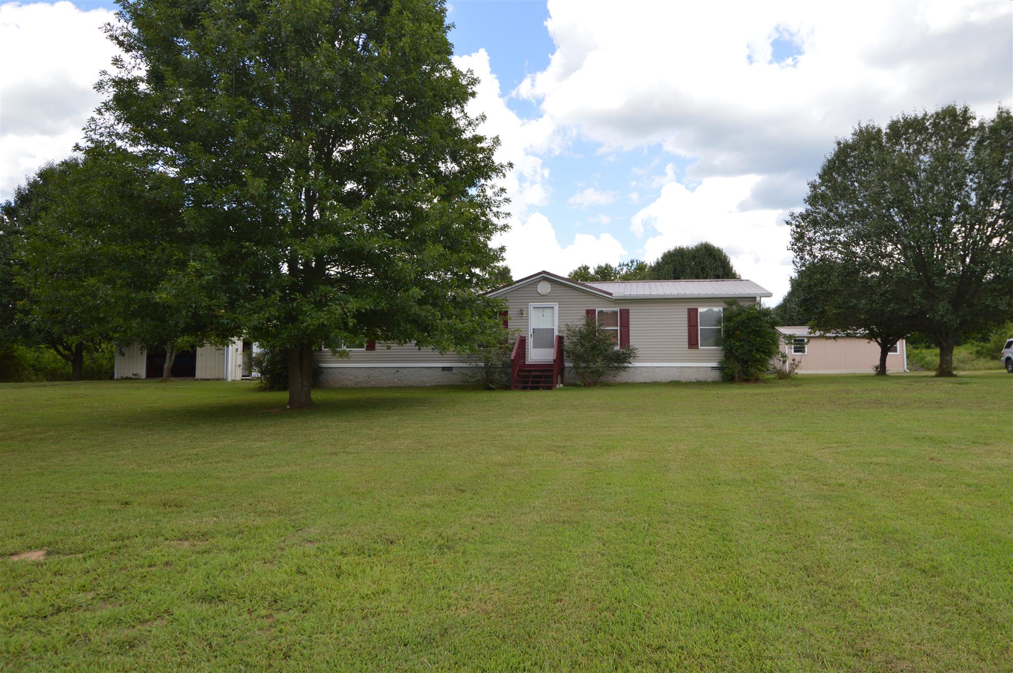 4579 Beech Log Road Lebanon, TN 37090 - Photo 26 of 30 a front view of a house with a garden