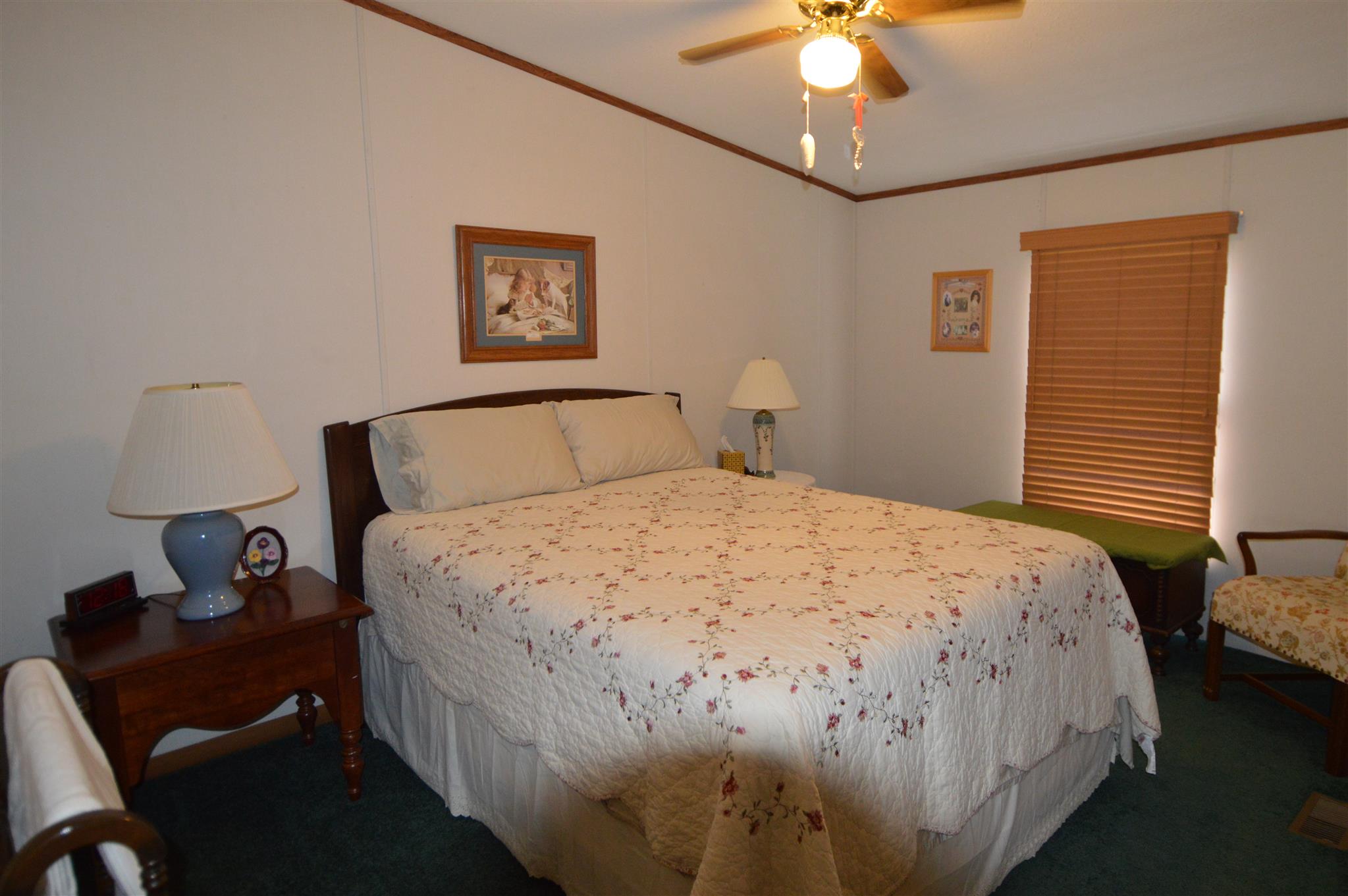 4579 Beech Log Road Lebanon, TN 37090 - Photo 10 of 30 a bedroom with a bed and a lamp