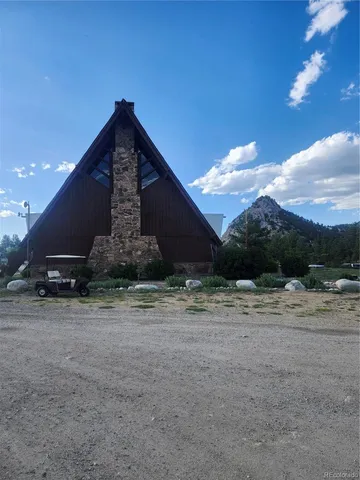 a backyard of a house with a yard and garage