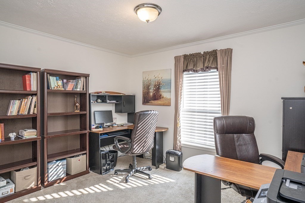 18 Linsay Drive Raynham, MA 02767 - Photo 12 of 41 a view of a workspace with furniture and a window
