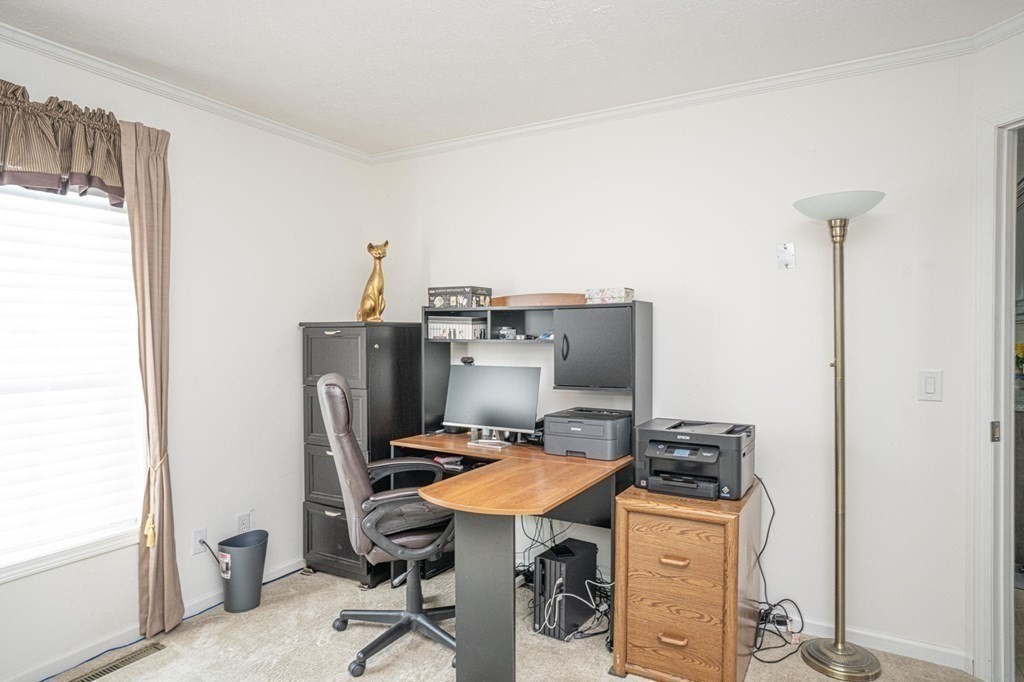 18 Linsay Drive Raynham, MA 02767 - Photo 16 of 41 a view of a workspace with furniture and a window