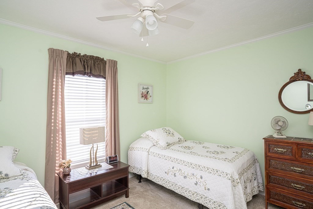 18 Linsay Drive Raynham, MA 02767 - Photo 17 of 41 a bedroom with a bed and a window