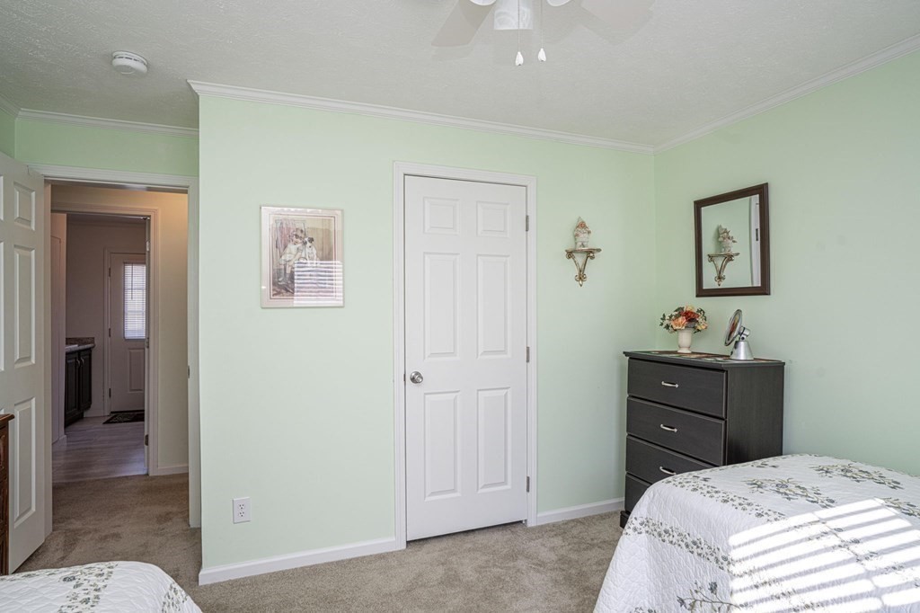 18 Linsay Drive Raynham, MA 02767 - Photo 20 of 41 a bedroom with a bed and a mirror