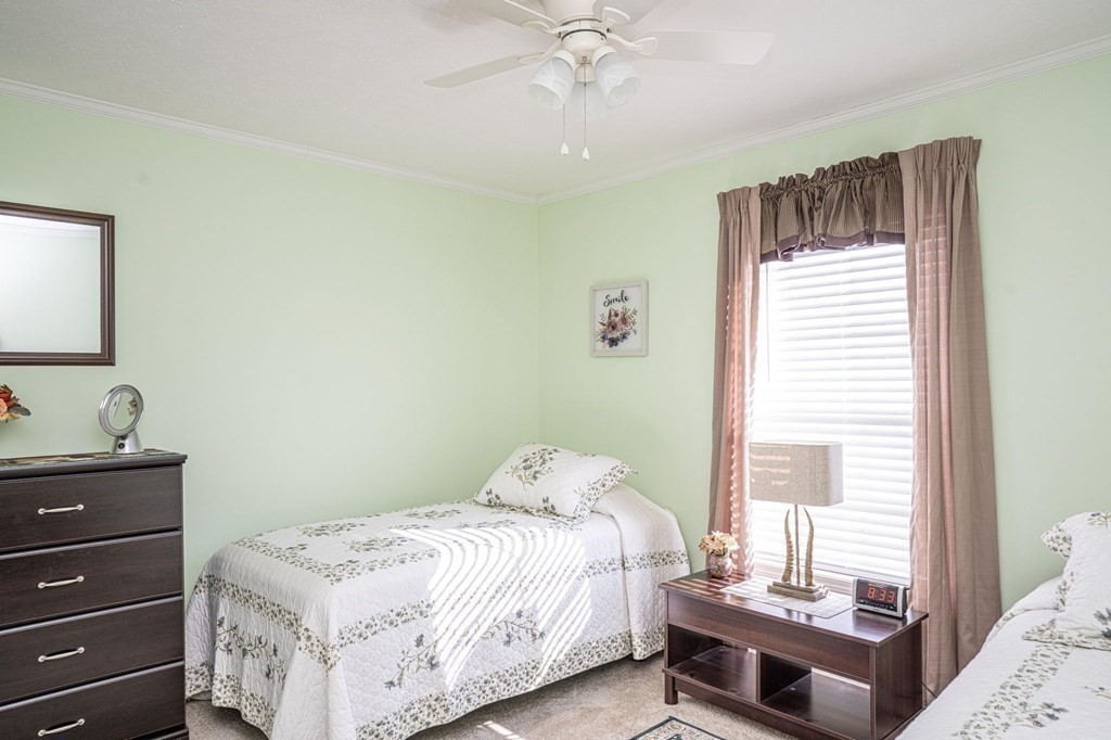 18 Linsay Drive Raynham, MA 02767 - Photo 21 of 41 a bedroom with a bed and a window