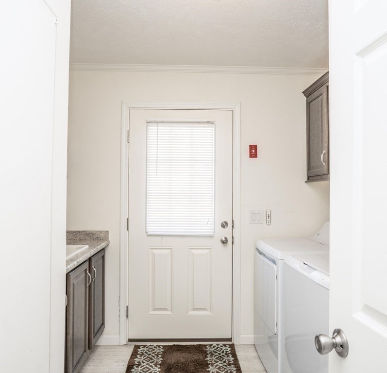 18 Linsay Drive Raynham, MA 02767 - Photo 23 of 41 a bathroom with a sink and a shower