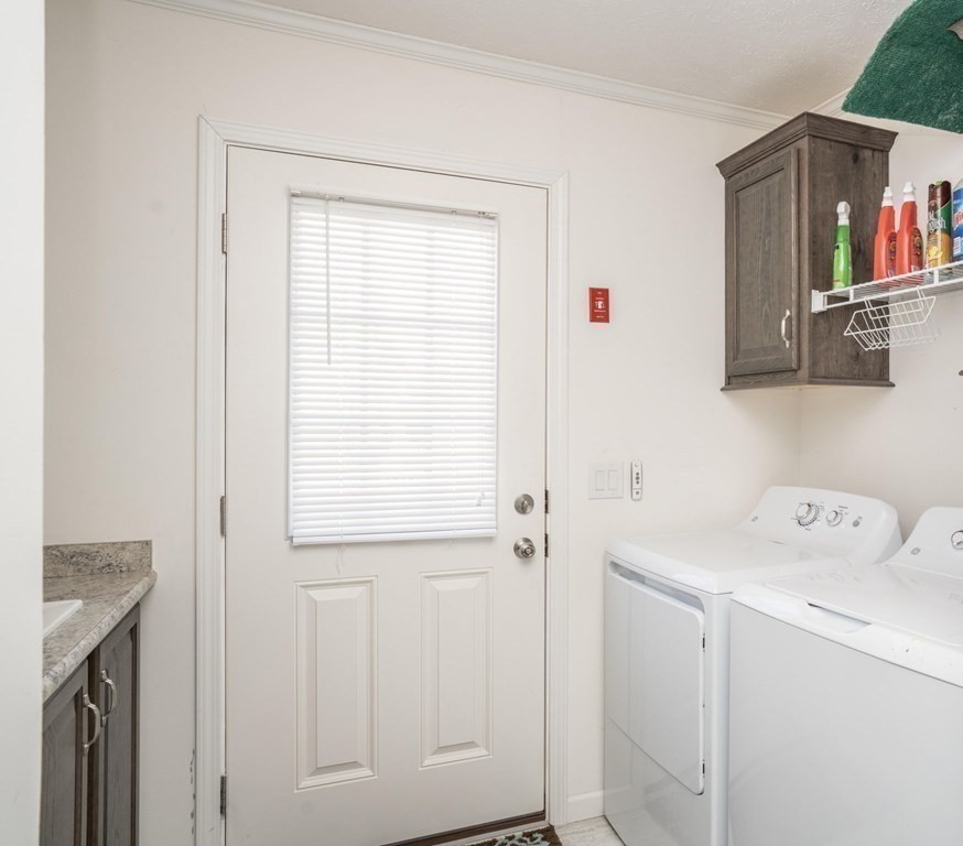 18 Linsay Drive Raynham, MA 02767 - Photo 24 of 41 a bathroom with a sink a vanity and a window