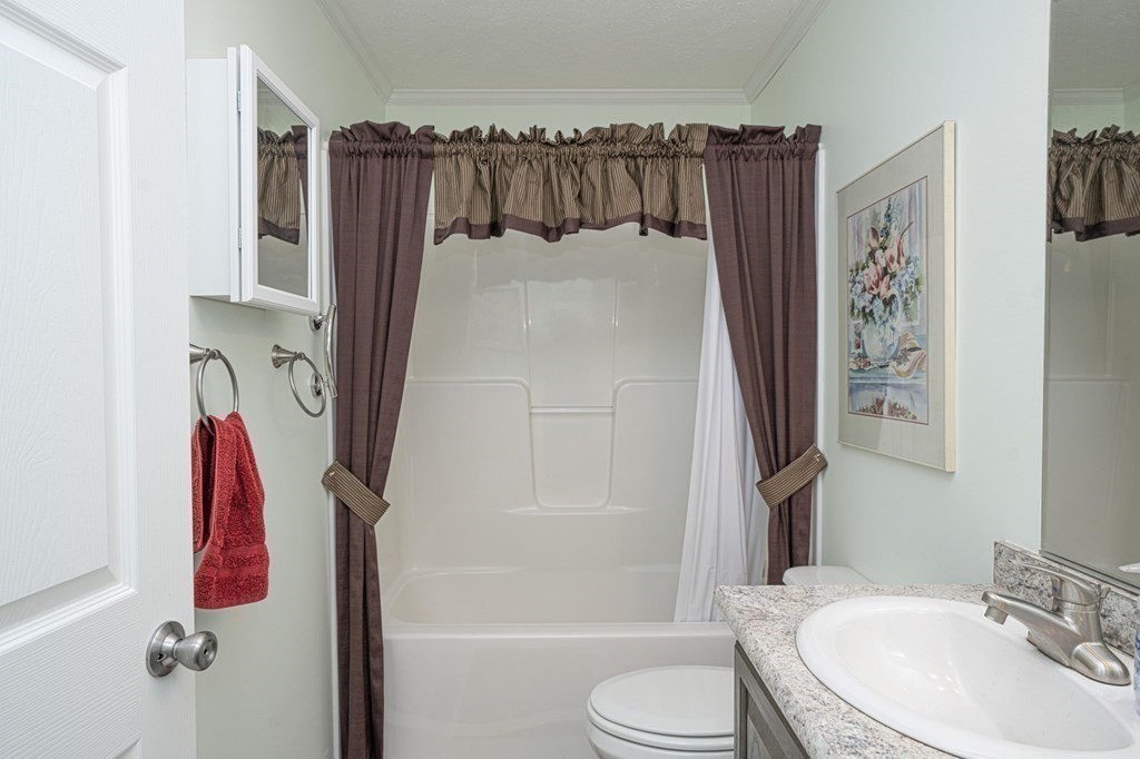 18 Linsay Drive Raynham, MA 02767 - Photo 26 of 41 a bathroom with a sink toilet and shower