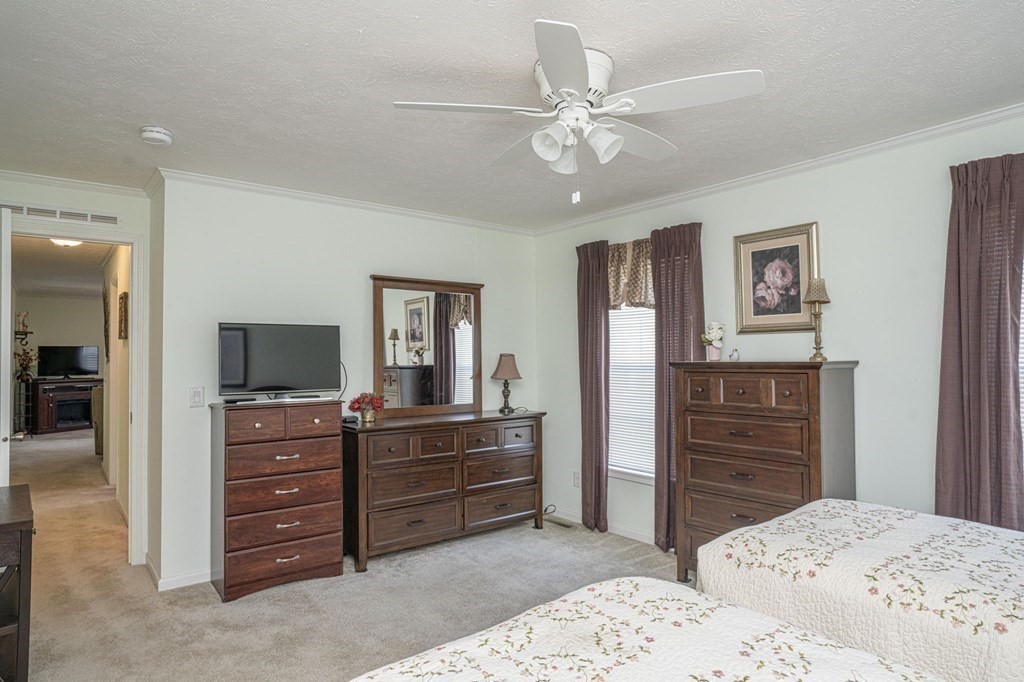 18 Linsay Drive Raynham, MA 02767 - Photo 28 of 41 a bedroom with a bed and furniture