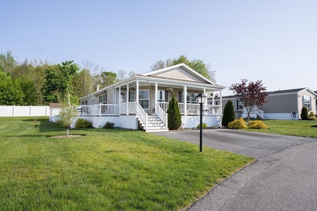 18 Linsay Drive Raynham, MA 02767 - Photo 33 of 41 a front view of a house with garden