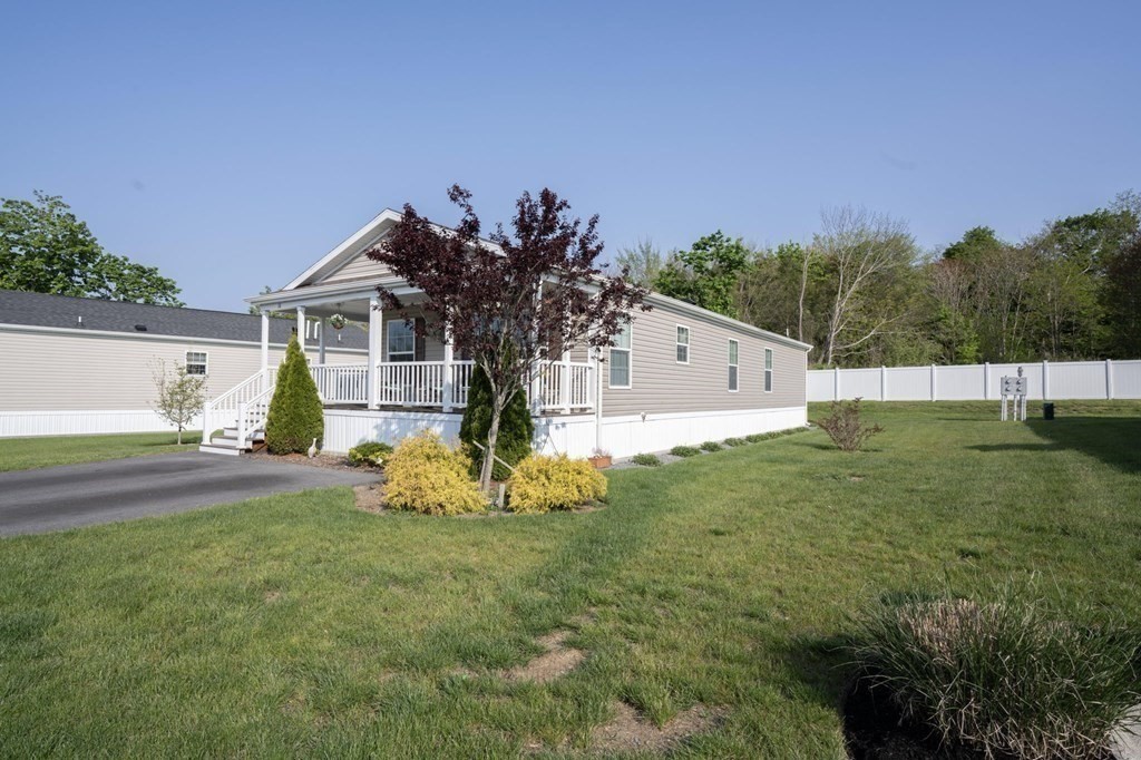18 Linsay Drive Raynham, MA 02767 - Photo 37 of 41 a front view of a house with garden