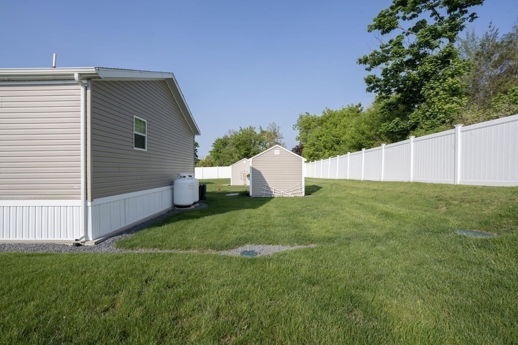 18 Linsay Drive Raynham, MA 02767 - Photo 40 of 41 a view of a back yard of the house