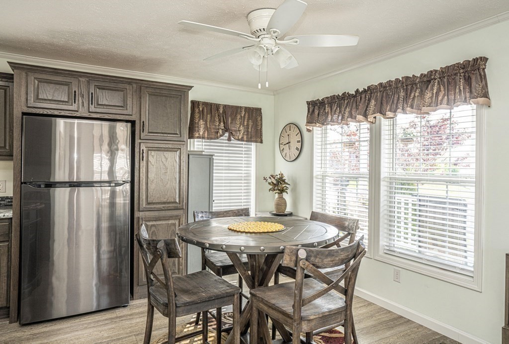 18 Linsay Drive Raynham, MA 02767 - Photo 9 of 41 a view of a dining room with furniture window and wooden floor