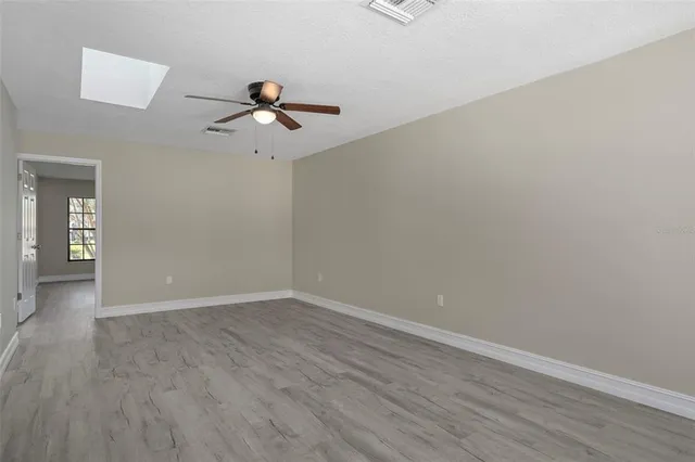 a view of a house with a swimming pool