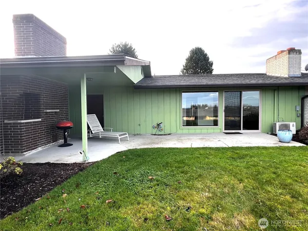 a front view of a house with a garage