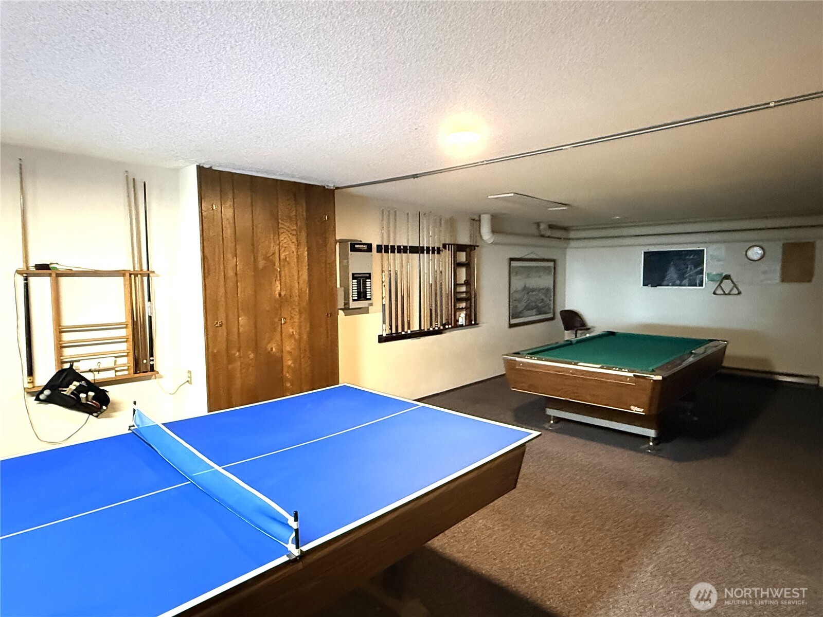 1301 South 3rd Avenue, Unit 5B Sequim, WA 98382 - Photo 24 of 24 a room with pool table and windows