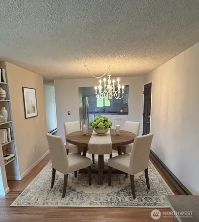 a view of a dining room with furniture