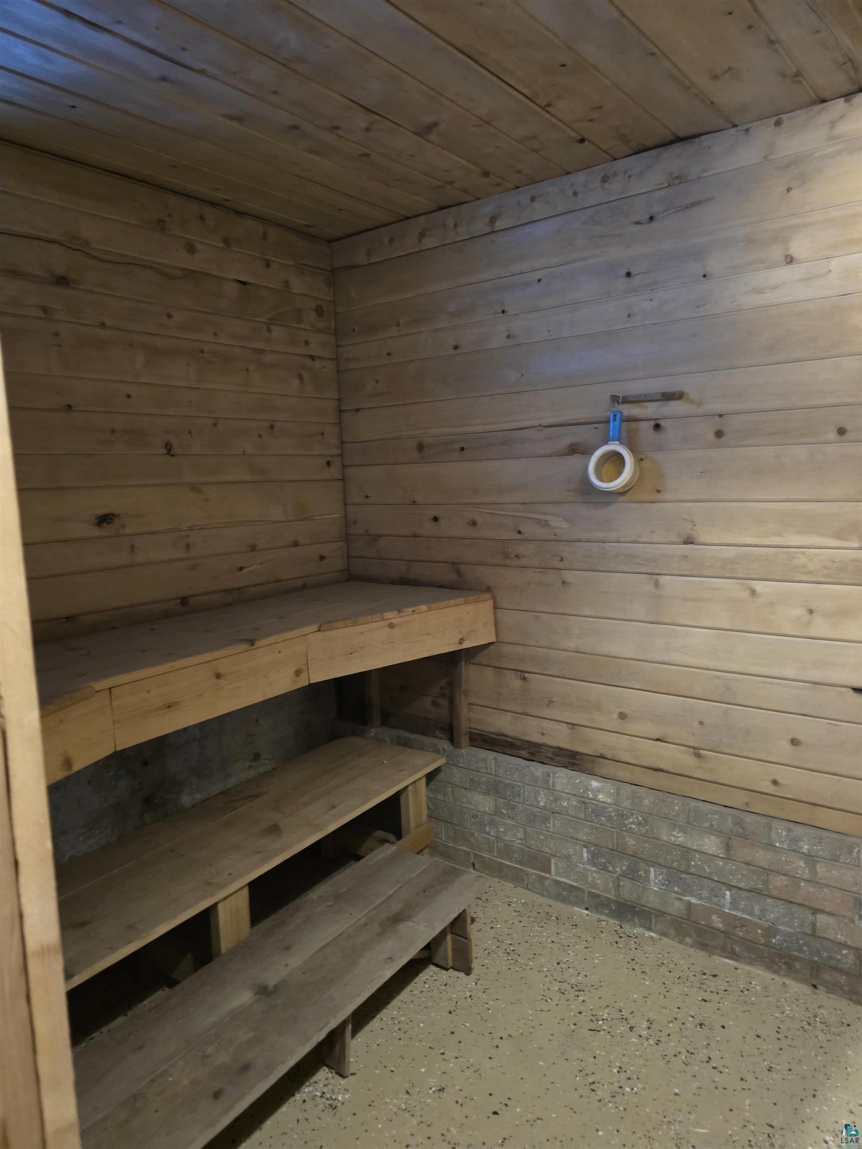406 North Road Cloquet, MN 55720 - Photo 18 of 26 Sauna with wooden ceiling and wooden walls